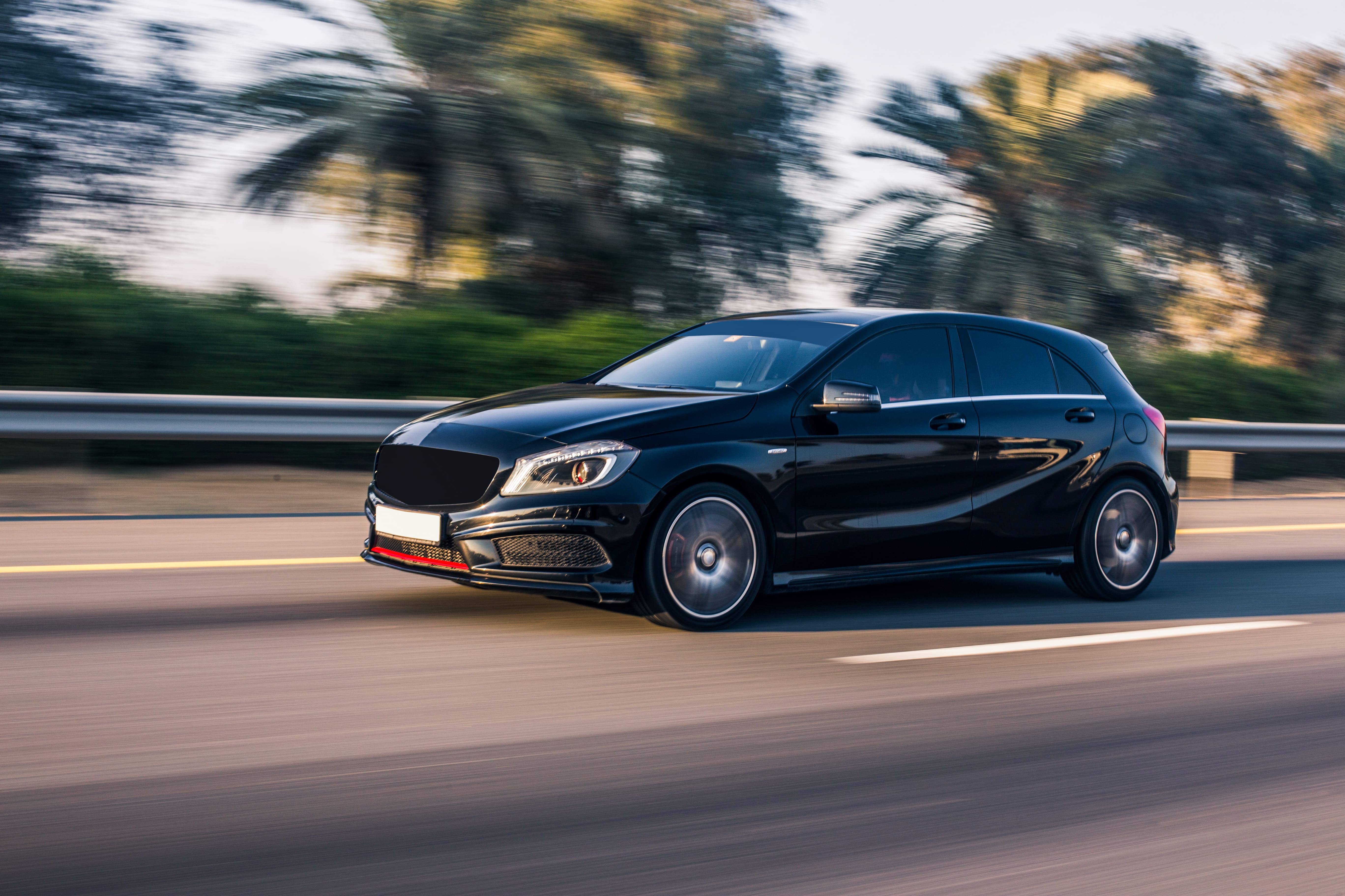 modern car on road, auto insurance concept, professional photography, clean image